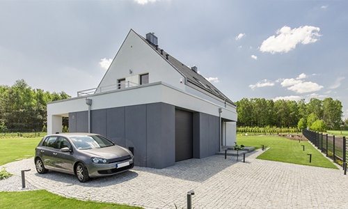 Extension de garage à toit plat par un architecte