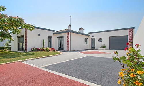 Extension à toit plat d'une maison de plain pied