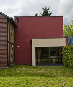 Extension rouge toit plat avec baie vitrée