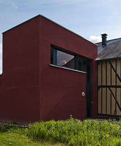 Extension cubique d'une maison à colombages